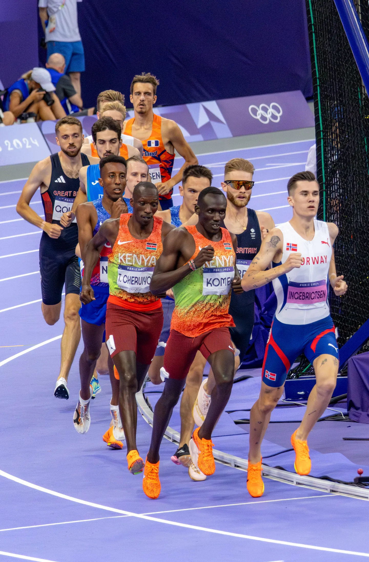 Lead pack of the men's 1500m final coming around the bend; Norway's Ingebrigtsen in the lead.